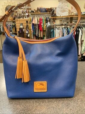 Dooney & Bourke Navy Blue Leather Hobo with Tan Trim and Tassel